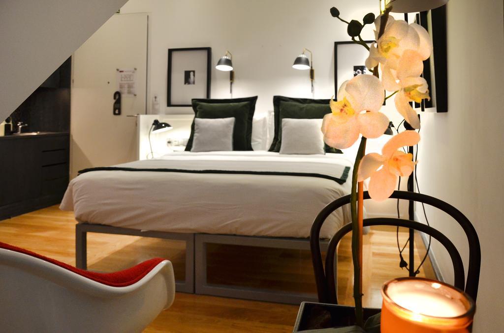 Quarto Duplo Mansard com Vista da Cidade