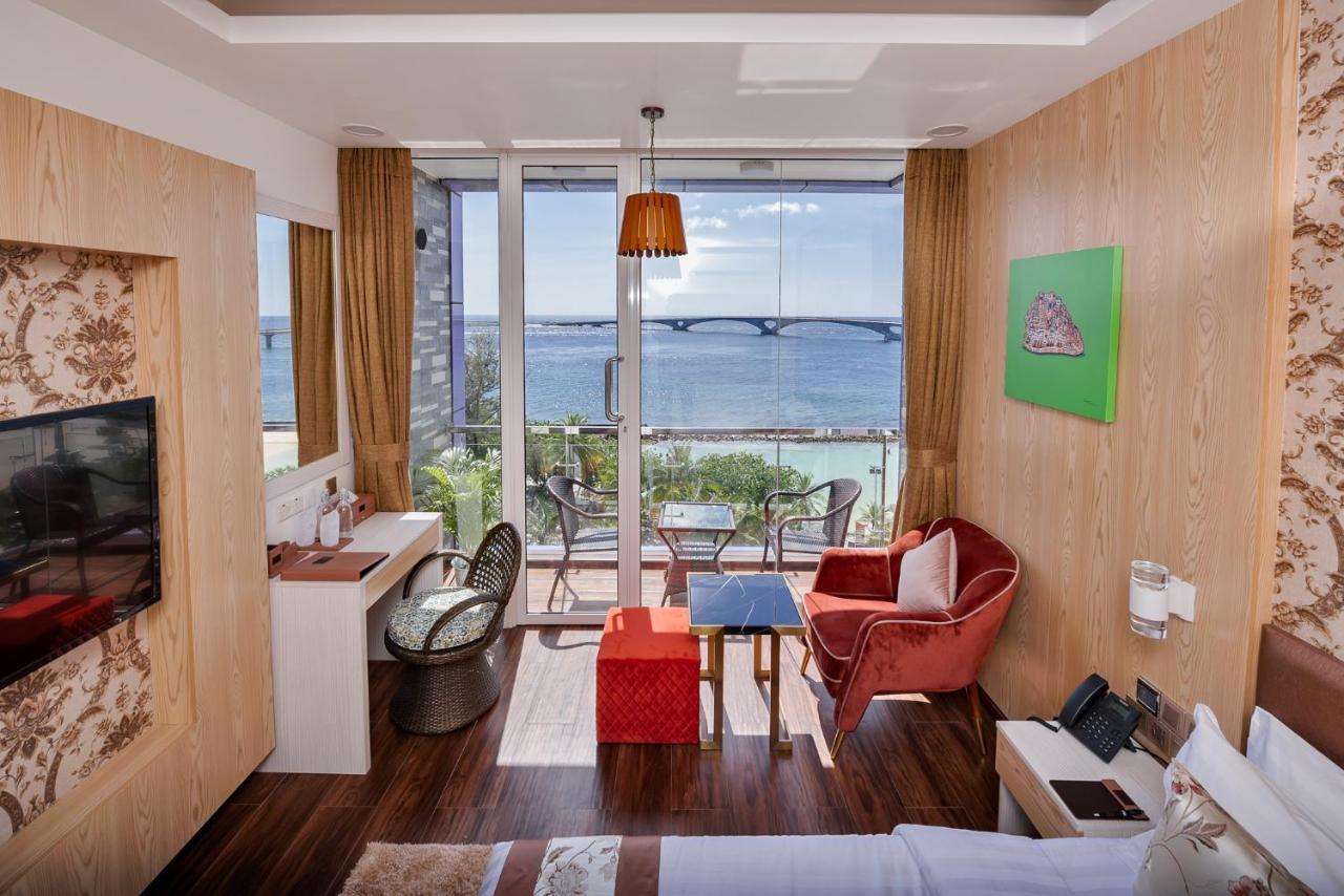 Deluxe Double Room Balcony Sea View Return Airport Transfer on Food & Beverage