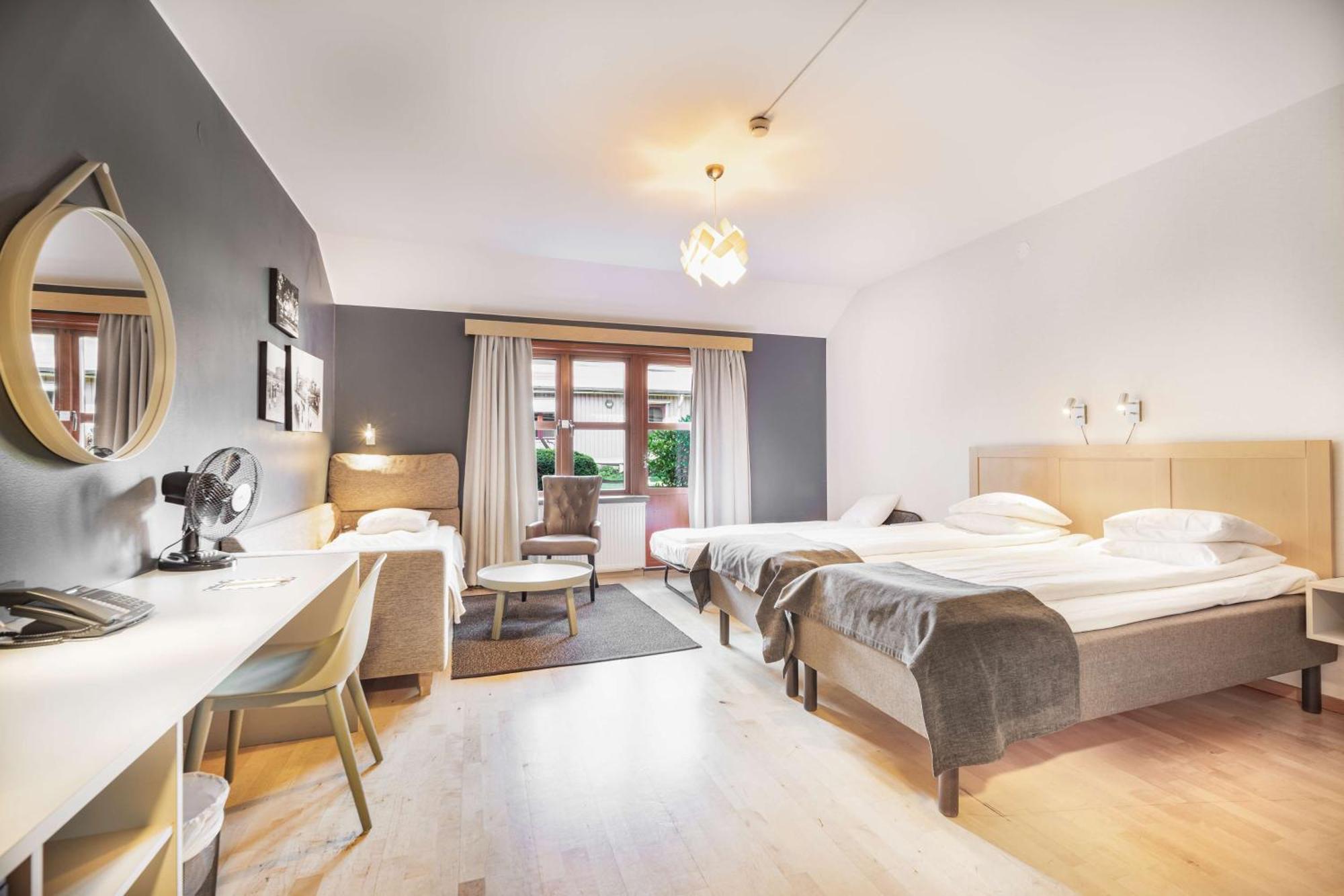 Family Twin Room with Sofa Bed and Roll out Bed