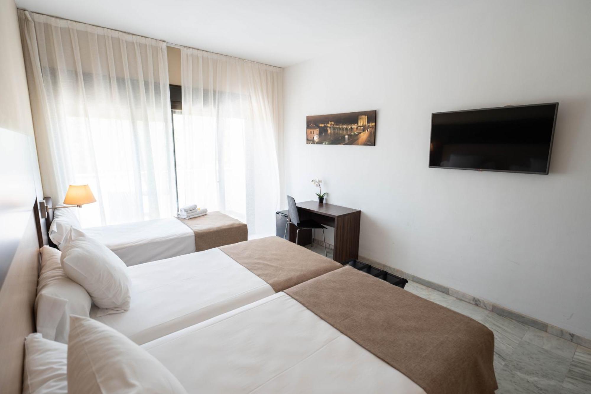 Tweepersoonskamer met Extra Bed (2 Volwassenen + 1 Kind)