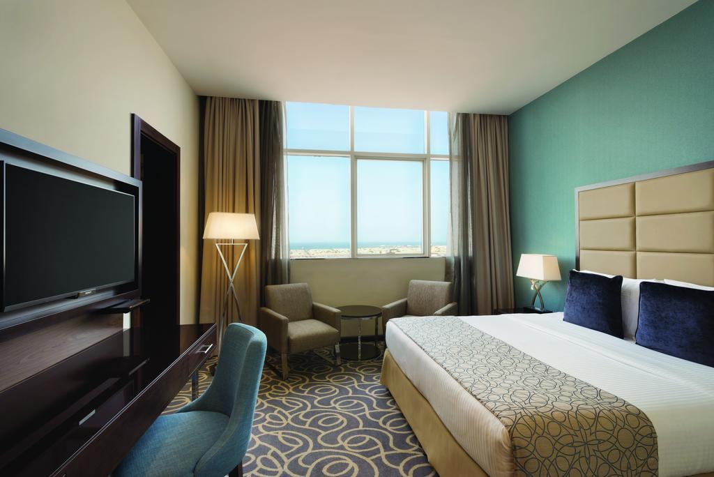 Deluxe King Room with Partial Sea View,196327942:JPEG