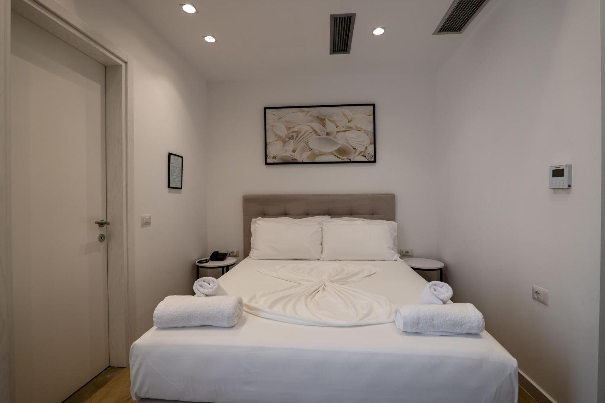 Chambre Double Deluxe - Vue Latérale sur Mer