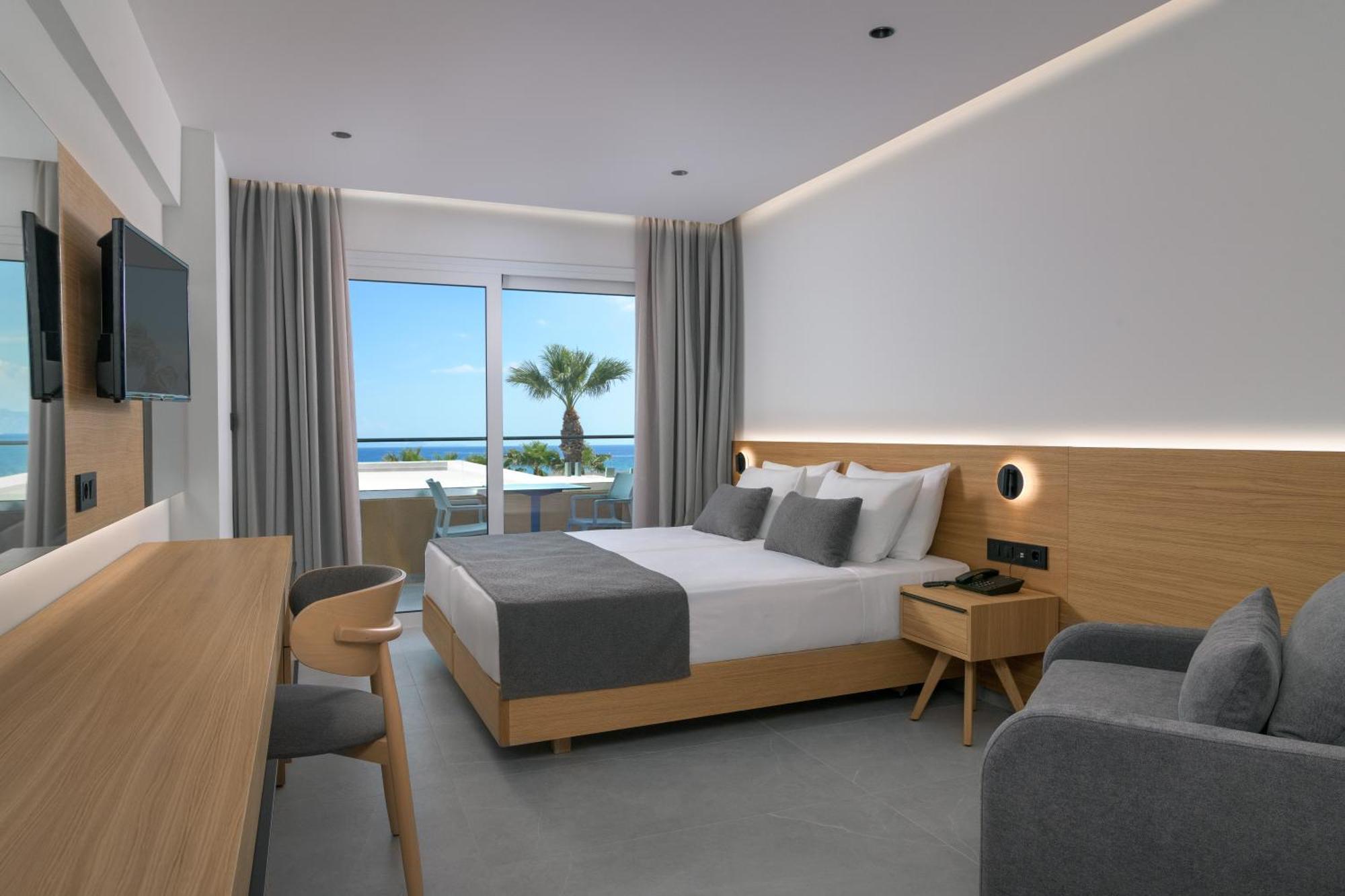 Chambre Double Deluxe - Vue Latérale sur Mer