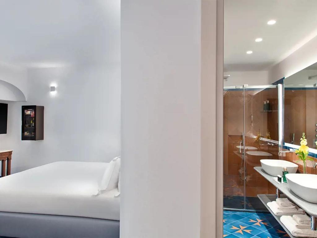 Habitación Doble Deluxe con balcón y vistas al mar