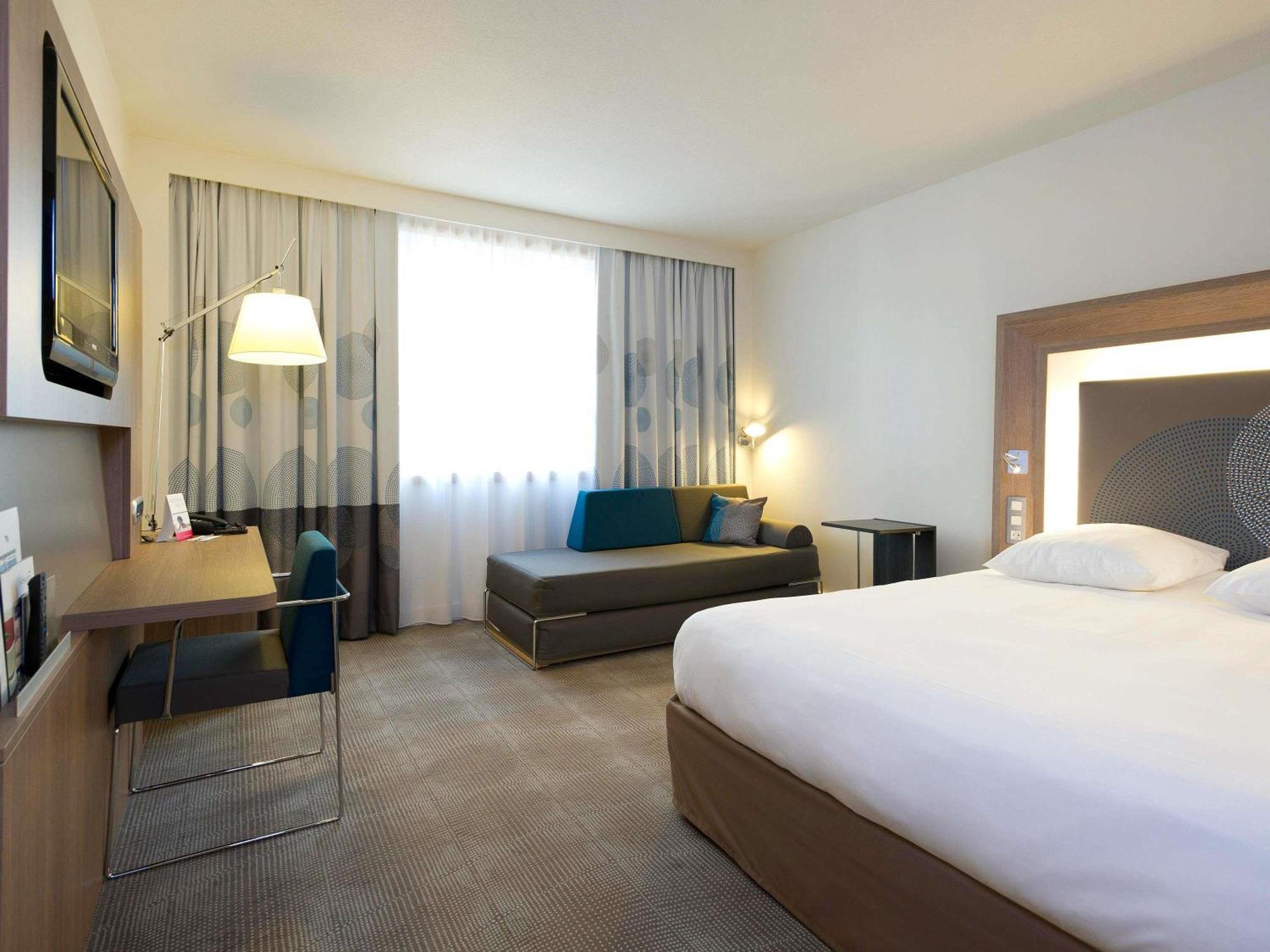Habitación Estándar con 1 cama doble y 2 camas individuales