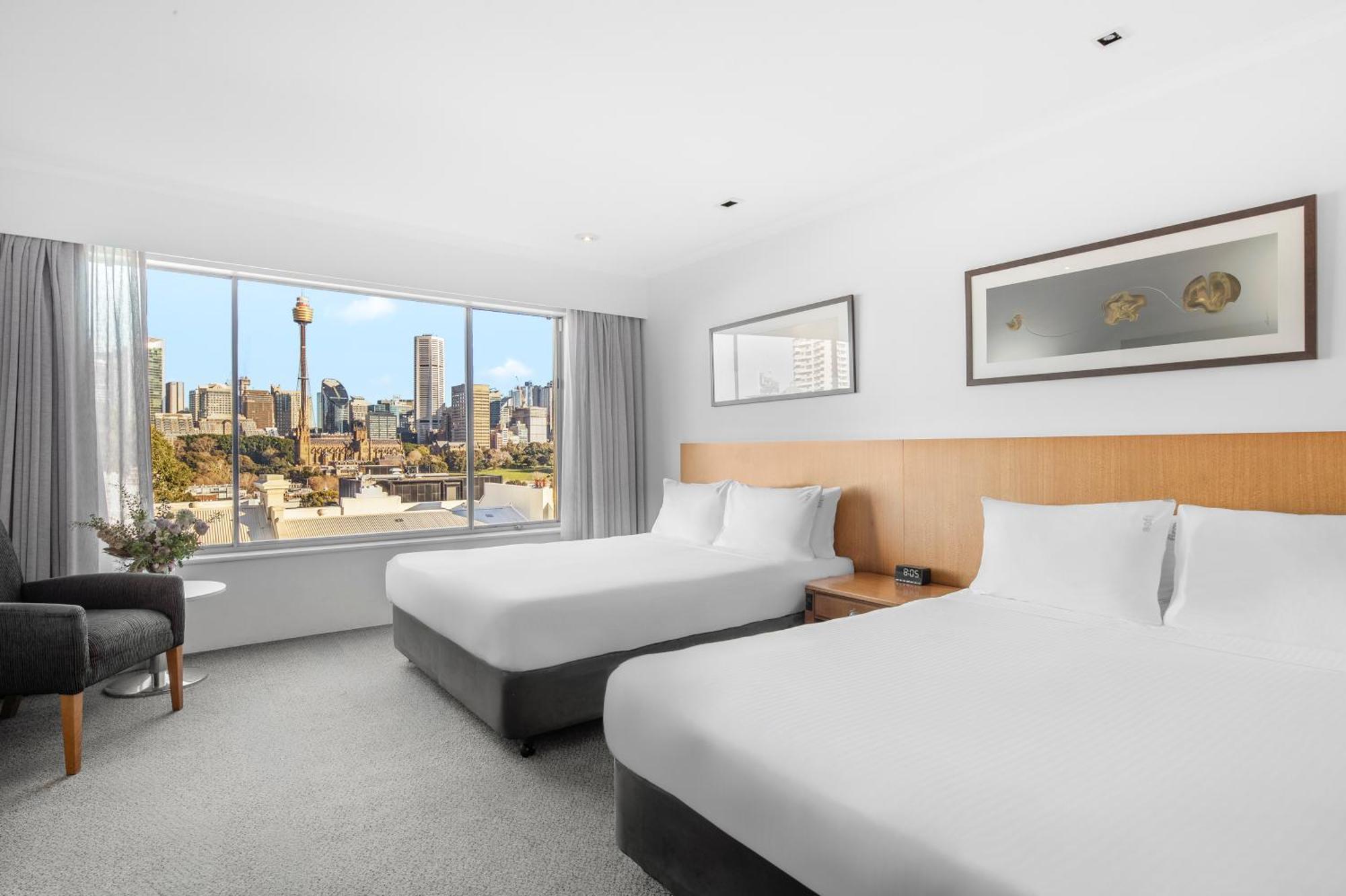 Habitación Doble Premium con 2 camas grandes y vistas a la ciudad