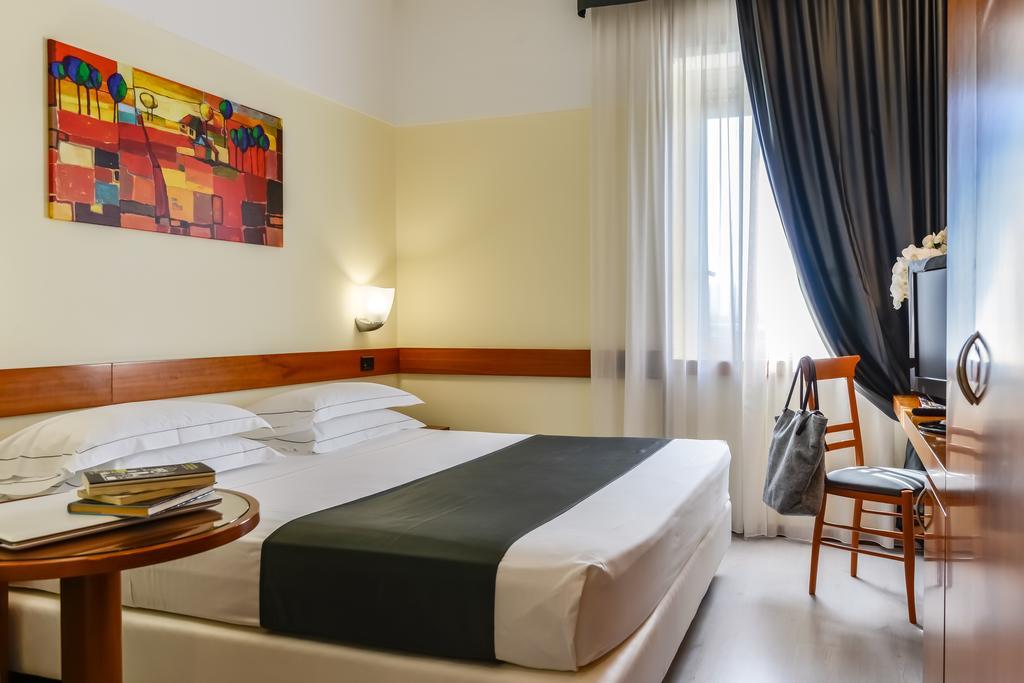 Quarto Standard com Cama de Casal ou 2 de Solteiro