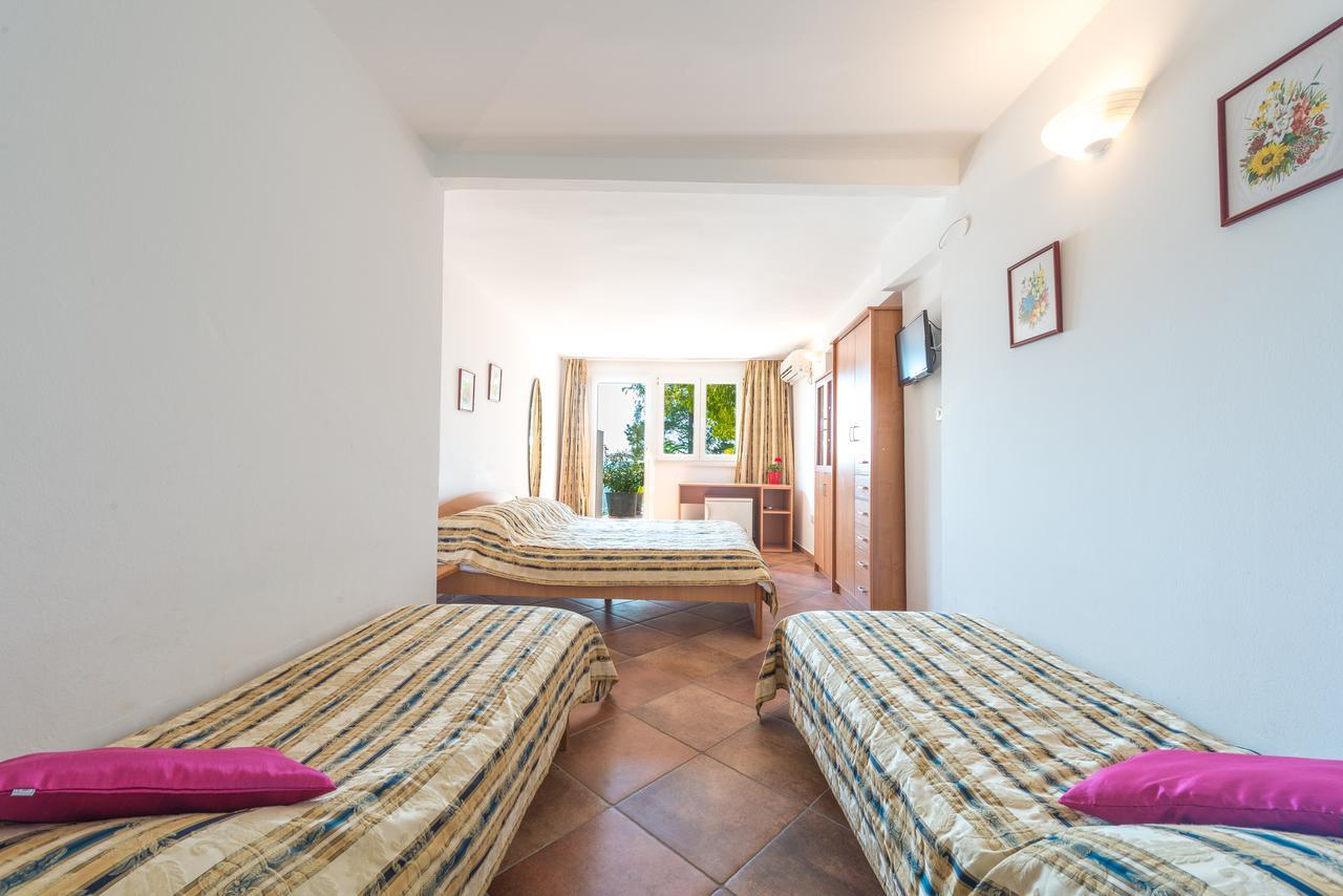 Chambre Triple avec Terrasse - Vue sur Mer