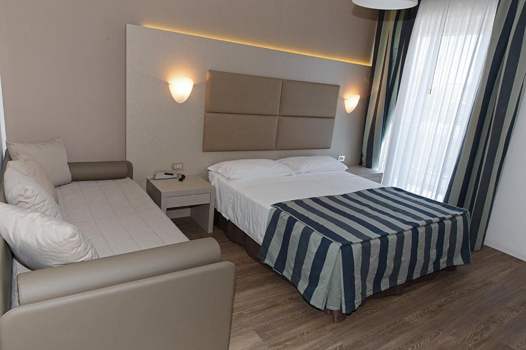 Superior Triple Room with Lateral Sea View