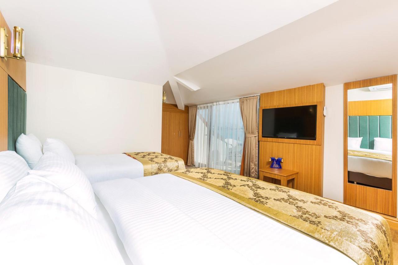 Superior Triple Room Sea View,775666246:JPEG
